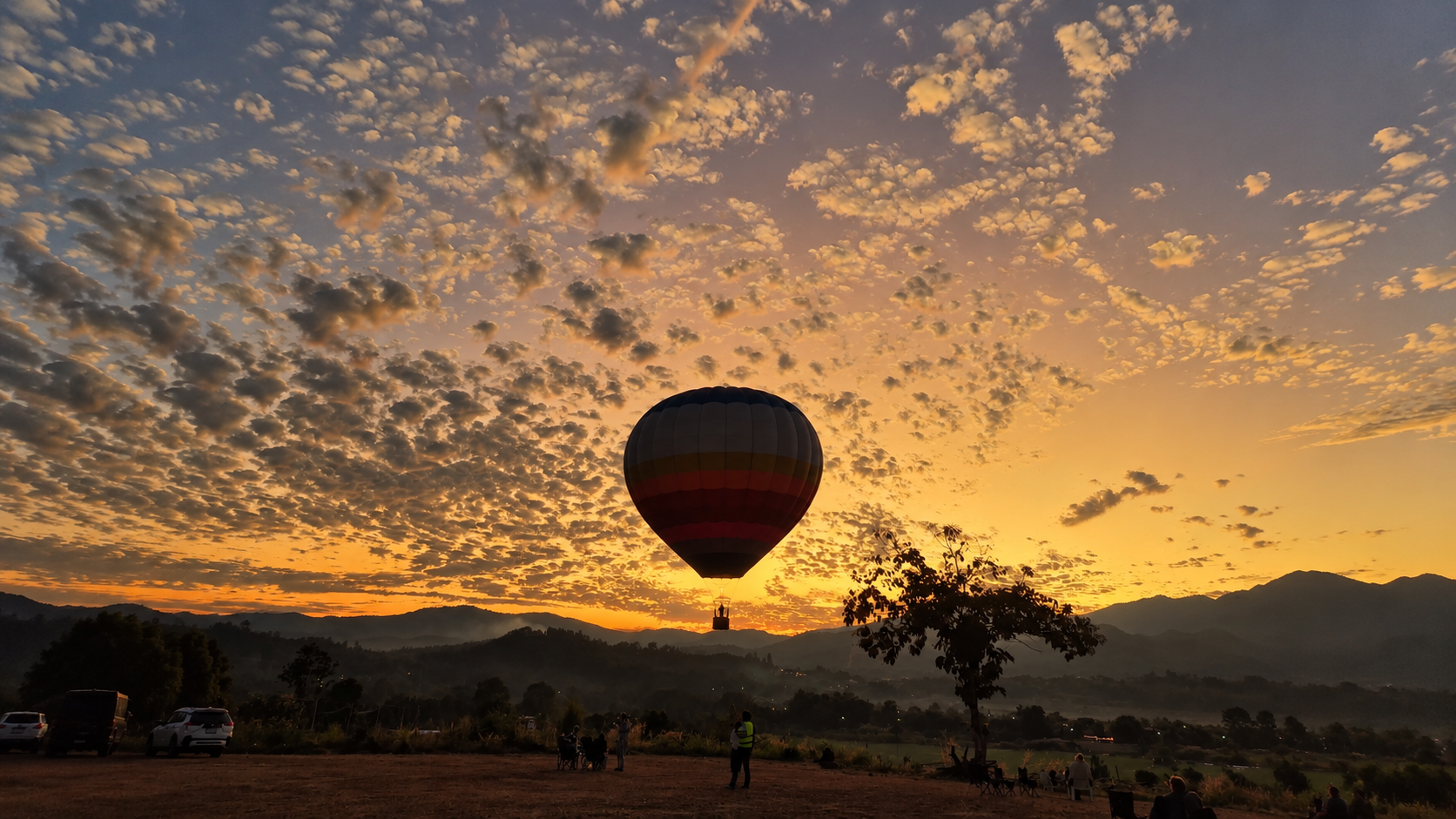 Tethered hot air balloon over Pai's mountain valley